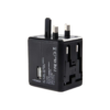Black travel adaptor with the UK/Middle East plug out.