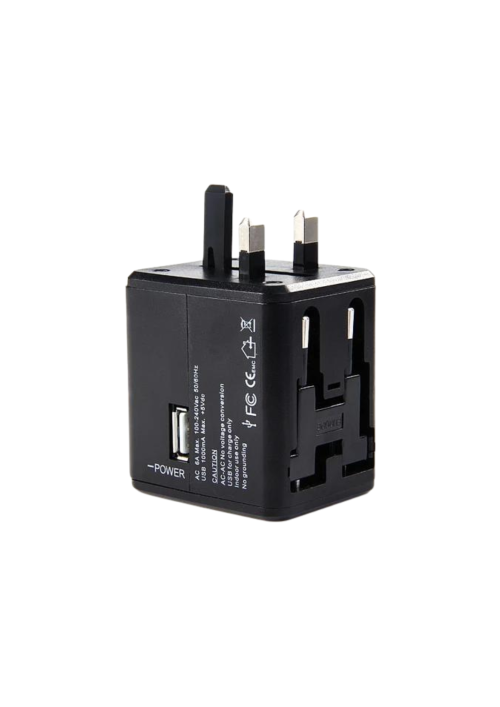Black travel adaptor with the UK/Middle East plug out.