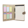 Sampe photo of an opend organizer notepad witg sticky notes, pad and pen.