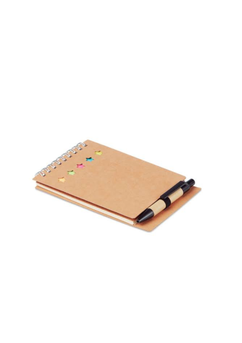 A photo of a bamboo notepad with small pen.