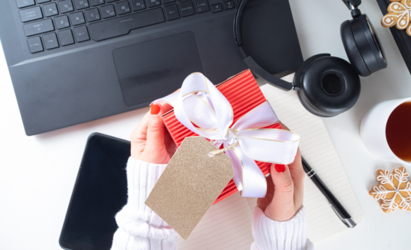 a-human-holding-a-red-gift-box