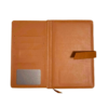an-open-brown-notebook-planner