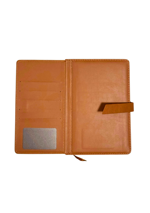 an-open-brown-notebook-planner