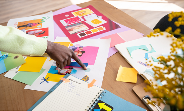 a-finger-pointing-to-a-colorful-mood-board