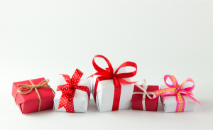 a-photo-of-gifts-wrapped-with-a-red-ribbon