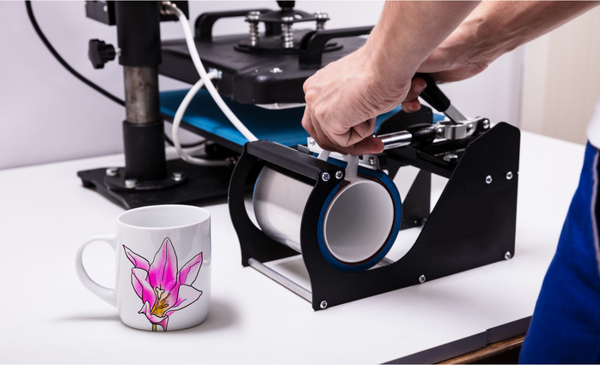 a-man-printing-on-a-mug