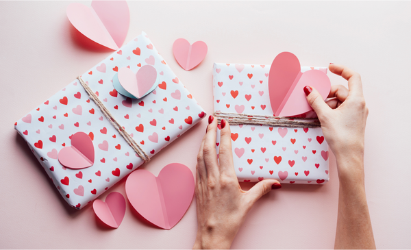 a-hand-making-a-valentine-gift