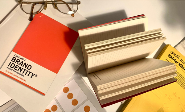 notebooks-on-top-of-desk