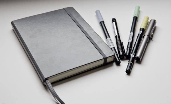 Gray-notebook-with-multiple-pens