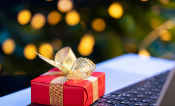 a-gift-beside-a-laptop